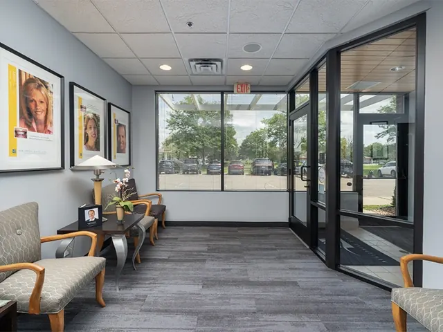 The bright waiting area inside Montgomery Wolken Dental Care, with windows onto City Centre Drive.