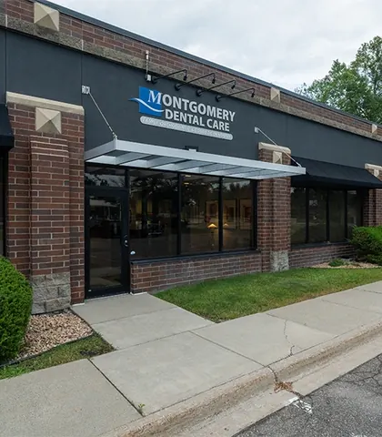 The practice entrance and its awning, seen from the sidewalk.